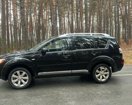 Черный Мицубиси Аутлендер, объемом двигателя 2 л и пробегом 280 тыс. км за 4500 $, фото 2 на Automoto.ua
