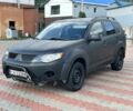 Черный Мицубиси Аутлендер, объемом двигателя 2 л и пробегом 285 тыс. км за 2950 $, фото 1 на Automoto.ua