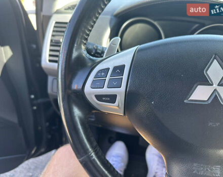 Черный Мицубиси Аутлендер, объемом двигателя 2 л и пробегом 240 тыс. км за 10999 $, фото 36 на Automoto.ua