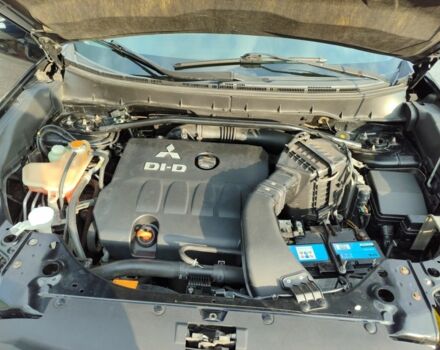 Черный Мицубиси Аутлендер, объемом двигателя 2 л и пробегом 104 тыс. км за 9900 $, фото 4 на Automoto.ua