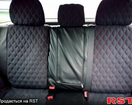 Черный Мицубиси Аутлендер, объемом двигателя 2 л и пробегом 280 тыс. км за 5800 $, фото 6 на Automoto.ua