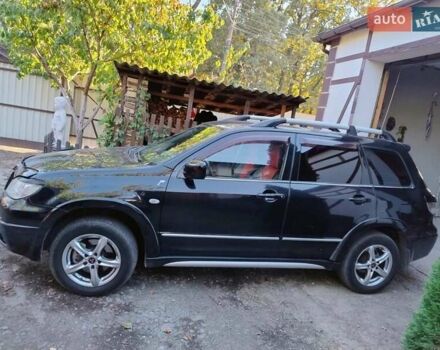 Черный Мицубиси Аутлендер, объемом двигателя 2 л и пробегом 223 тыс. км за 7200 $, фото 5 на Automoto.ua