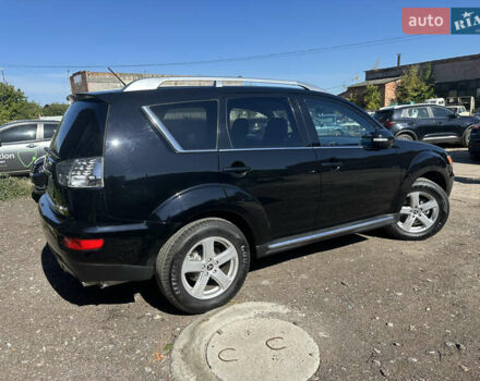 Черный Мицубиси Аутлендер, объемом двигателя 2 л и пробегом 240 тыс. км за 10999 $, фото 13 на Automoto.ua
