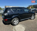 Черный Мицубиси Аутлендер, объемом двигателя 2 л и пробегом 240 тыс. км за 10999 $, фото 13 на Automoto.ua