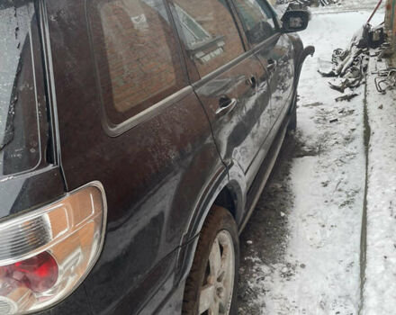 Черный Мицубиси Аутлендер, объемом двигателя 2 л и пробегом 109 тыс. км за 1550 $, фото 3 на Automoto.ua