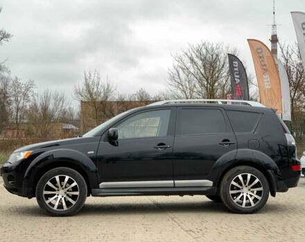 Черный Мицубиси Аутлендер, объемом двигателя 2.4 л и пробегом 175 тыс. км за 10499 $, фото 3 на Automoto.ua