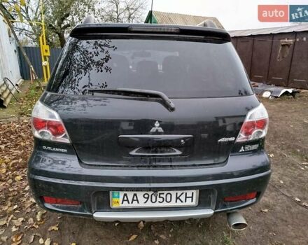 Чорний Міцубісі Аутлендер, об'ємом двигуна 2.38 л та пробігом 149 тис. км за 8800 $, фото 5 на Automoto.ua