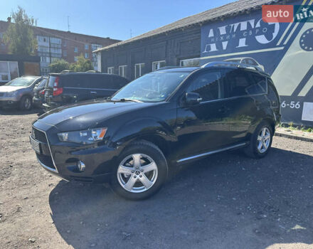 Черный Мицубиси Аутлендер, объемом двигателя 2 л и пробегом 240 тыс. км за 10999 $, фото 4 на Automoto.ua