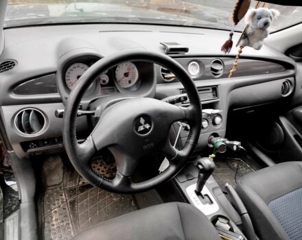 Черный Мицубиси Аутлендер, объемом двигателя 2.4 л и пробегом 149 тыс. км за 8800 $, фото 8 на Automoto.ua