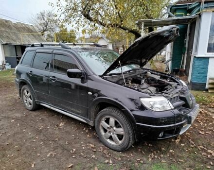 Черный Мицубиси Аутлендер, объемом двигателя 2.4 л и пробегом 149 тыс. км за 8800 $, фото 5 на Automoto.ua