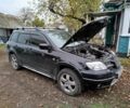 Черный Мицубиси Аутлендер, объемом двигателя 2.4 л и пробегом 149 тыс. км за 8800 $, фото 5 на Automoto.ua