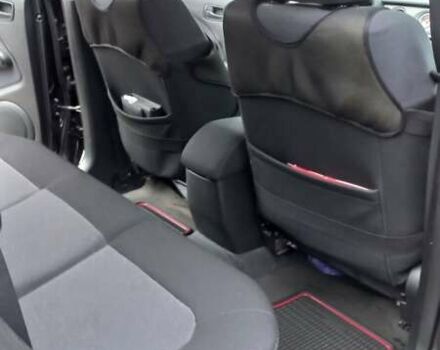 Черный Мицубиси Аутлендер, объемом двигателя 2 л и пробегом 73 тыс. км за 9500 $, фото 24 на Automoto.ua