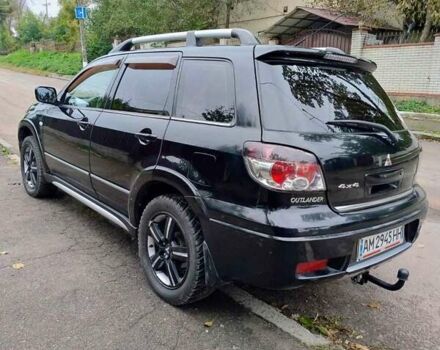 Черный Мицубиси Аутлендер, объемом двигателя 2 л и пробегом 223 тыс. км за 7200 $, фото 6 на Automoto.ua