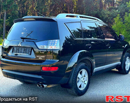 Чорний Міцубісі Аутлендер, об'ємом двигуна 2.4 л та пробігом 171 тис. км за 8999 $, фото 6 на Automoto.ua