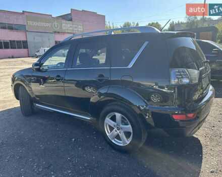 Черный Мицубиси Аутлендер, объемом двигателя 2 л и пробегом 240 тыс. км за 10999 $, фото 6 на Automoto.ua