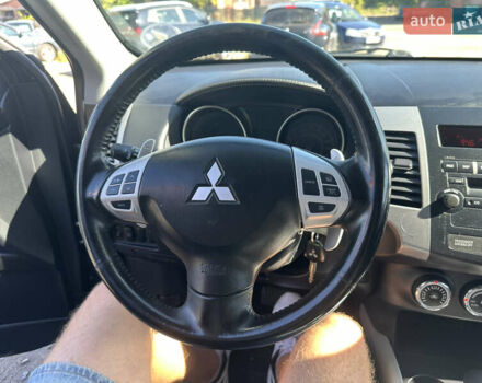 Черный Мицубиси Аутлендер, объемом двигателя 2 л и пробегом 240 тыс. км за 10999 $, фото 35 на Automoto.ua