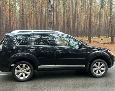 Черный Мицубиси Аутлендер, объемом двигателя 2 л и пробегом 280 тыс. км за 4500 $, фото 7 на Automoto.ua
