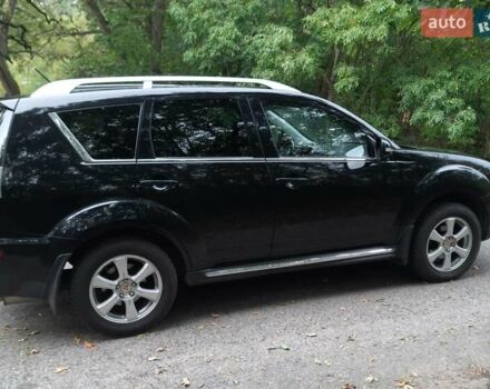 Чорний Міцубісі Аутлендер, об'ємом двигуна 2 л та пробігом 220 тис. км за 10700 $, фото 3 на Automoto.ua