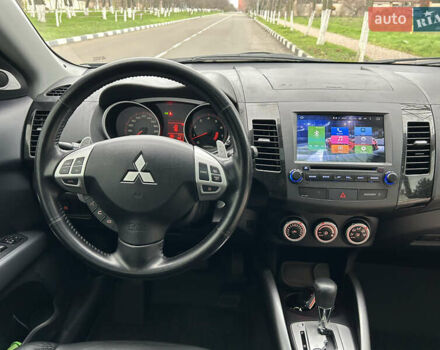 Черный Мицубиси Аутлендер, объемом двигателя 3 л и пробегом 77 тыс. км за 11800 $, фото 31 на Automoto.ua