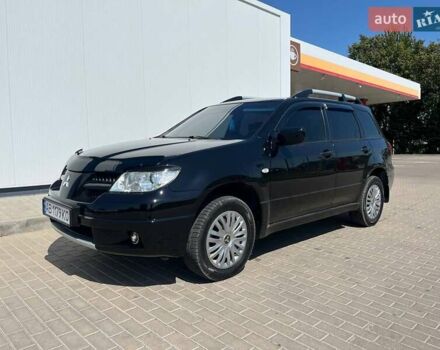Черный Мицубиси Аутлендер, объемом двигателя 2 л и пробегом 236 тыс. км за 6699 $, фото 9 на Automoto.ua