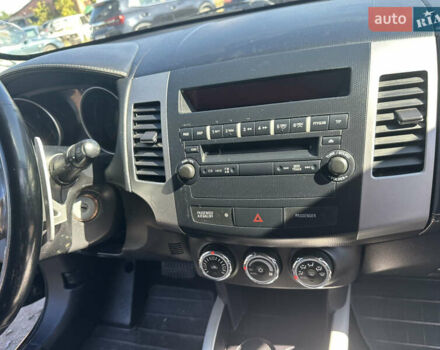 Черный Мицубиси Аутлендер, объемом двигателя 2 л и пробегом 240 тыс. км за 10999 $, фото 31 на Automoto.ua