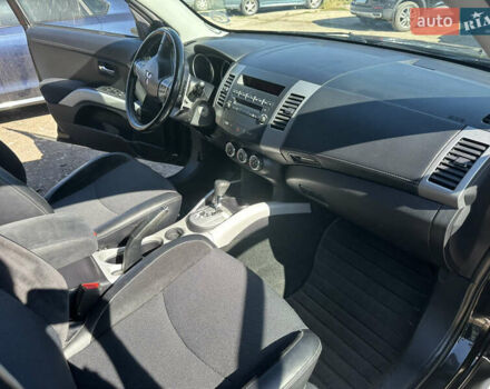 Черный Мицубиси Аутлендер, объемом двигателя 2 л и пробегом 240 тыс. км за 10999 $, фото 27 на Automoto.ua