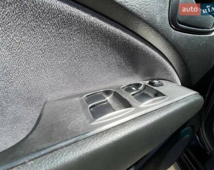 Черный Мицубиси Аутлендер, объемом двигателя 2 л и пробегом 236 тыс. км за 6699 $, фото 12 на Automoto.ua