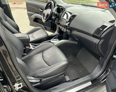 Черный Мицубиси Аутлендер, объемом двигателя 3 л и пробегом 77 тыс. км за 11800 $, фото 20 на Automoto.ua