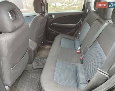 Чорний Міцубісі Аутлендер, об'ємом двигуна 2.38 л та пробігом 149 тис. км за 8800 $, фото 11 на Automoto.ua