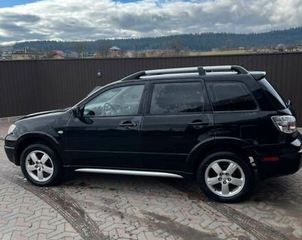Черный Мицубиси Аутлендер, объемом двигателя 2.38 л и пробегом 220 тыс. км за 7500 $, фото 6 на Automoto.ua