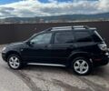 Черный Мицубиси Аутлендер, объемом двигателя 2.38 л и пробегом 220 тыс. км за 7500 $, фото 6 на Automoto.ua
