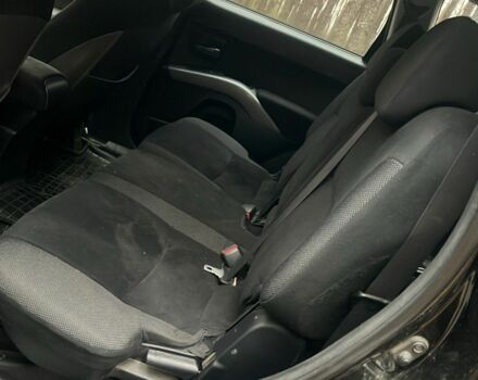 Черный Мицубиси Аутлендер, объемом двигателя 2 л и пробегом 280 тыс. км за 4500 $, фото 8 на Automoto.ua