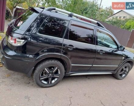 Черный Мицубиси Аутлендер, объемом двигателя 2 л и пробегом 223 тыс. км за 7200 $, фото 9 на Automoto.ua
