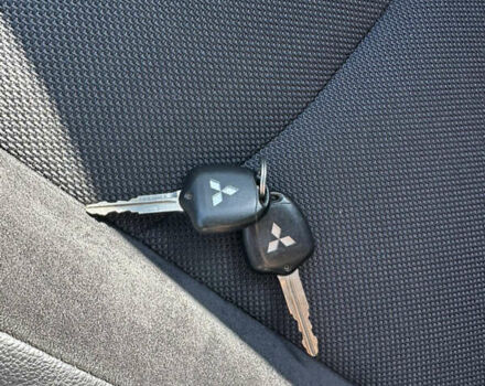 Черный Мицубиси Аутлендер, объемом двигателя 2 л и пробегом 240 тыс. км за 10999 $, фото 45 на Automoto.ua