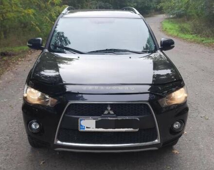 Чорний Міцубісі Аутлендер, об'ємом двигуна 2 л та пробігом 220 тис. км за 10700 $, фото 1 на Automoto.ua