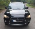 Чорний Міцубісі Аутлендер, об'ємом двигуна 2 л та пробігом 220 тис. км за 10700 $, фото 1 на Automoto.ua
