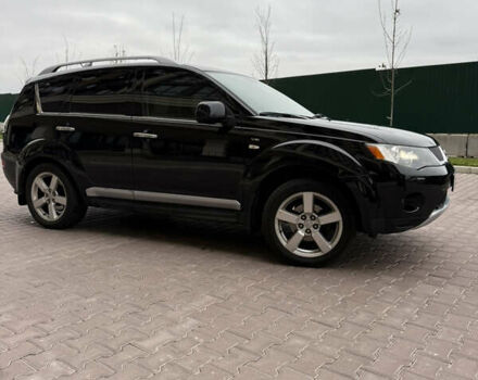 Черный Мицубиси Аутлендер, объемом двигателя 3 л и пробегом 260 тыс. км за 9500 $, фото 2 на Automoto.ua