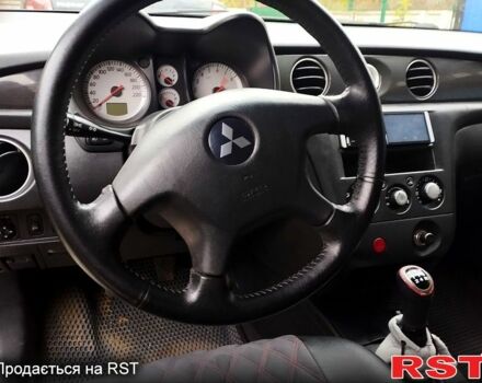 Черный Мицубиси Аутлендер, объемом двигателя 2 л и пробегом 280 тыс. км за 5800 $, фото 7 на Automoto.ua