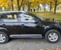 Міцубісі Аутлендер 2009 у Хмельницькому на Automoto.ua Чорний Міцубісі Аутлендер, об'ємом двигуна 2.4 л та пробігом 157 тис. км за 8500 $, фото 9 на Automoto.ua