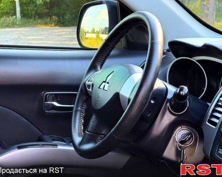 Чорний Міцубісі Аутлендер, об'ємом двигуна 2.4 л та пробігом 171 тис. км за 8999 $, фото 10 на Automoto.ua