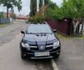 Черный Мицубиси Аутлендер, объемом двигателя 2 л и пробегом 223 тыс. км за 7200 $, фото 1 на Automoto.ua