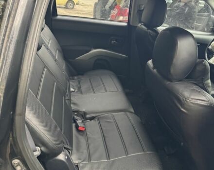 Черный Мицубиси Аутлендер, объемом двигателя 2.4 л и пробегом 246 тыс. км за 2600 $, фото 4 на Automoto.ua