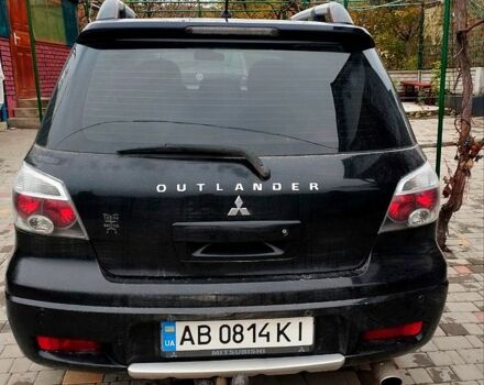 Черный Мицубиси Аутлендер, объемом двигателя 2 л и пробегом 280 тыс. км за 5800 $, фото 5 на Automoto.ua