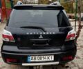 Черный Мицубиси Аутлендер, объемом двигателя 2 л и пробегом 280 тыс. км за 5800 $, фото 5 на Automoto.ua