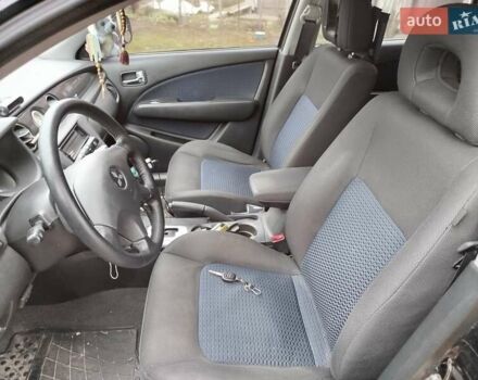 Чорний Міцубісі Аутлендер, об'ємом двигуна 2.38 л та пробігом 149 тис. км за 8800 $, фото 7 на Automoto.ua