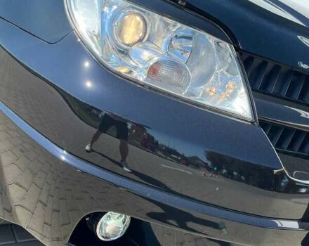 Черный Мицубиси Аутлендер, объемом двигателя 2 л и пробегом 236 тыс. км за 6699 $, фото 4 на Automoto.ua