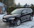 Черный Мицубиси Аутлендер, объемом двигателя 2 л и пробегом 212 тыс. км за 3000 $, фото 1 на Automoto.ua