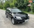 Чорний Міцубісі Аутлендер, об'ємом двигуна 2 л та пробігом 79 тис. км за 9500 $, фото 37 на Automoto.ua