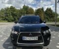Черный Мицубиси Аутлендер, объемом двигателя 2.4 л и пробегом 233 тыс. км за 9800 $, фото 5 на Automoto.ua