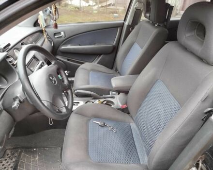 Черный Мицубиси Аутлендер, объемом двигателя 2.4 л и пробегом 149 тыс. км за 8800 $, фото 7 на Automoto.ua